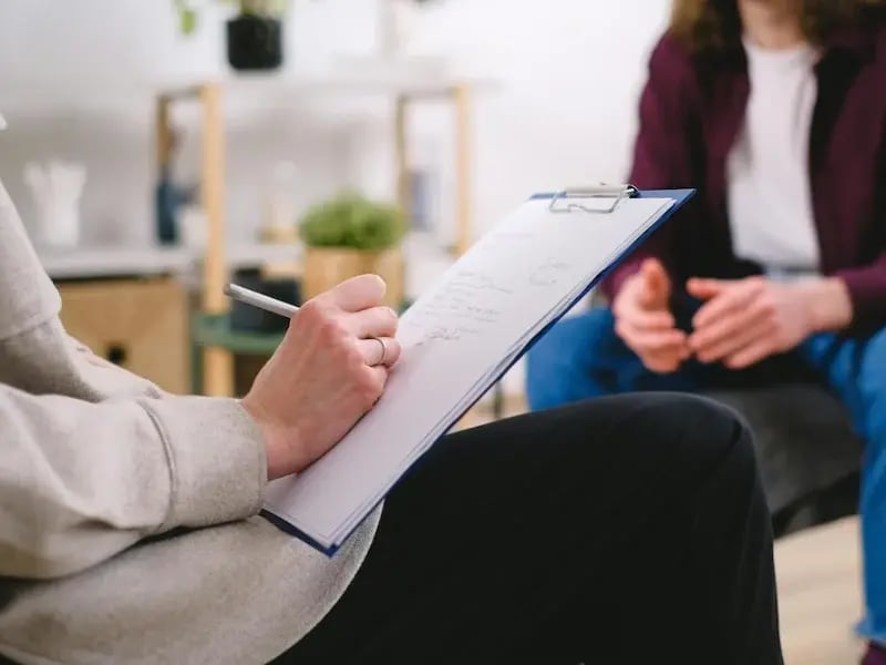 therapy-women-talking-filling-form