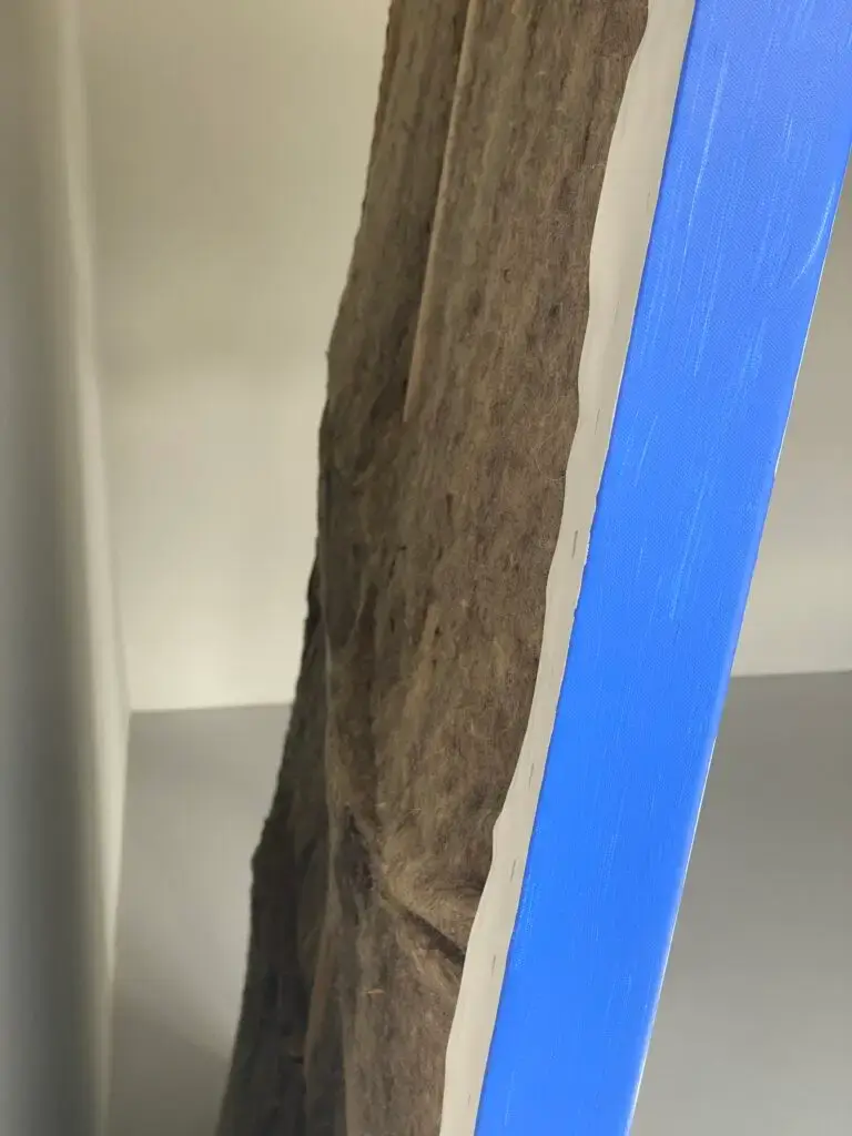 Office soundproofing panels installed on walls and ceiling.