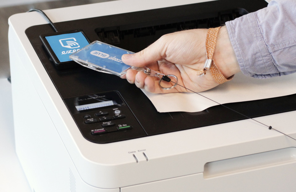 Secure pull printing via authentication at the printer with RFID card